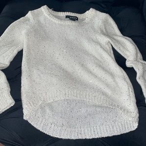 Jordache silver sequin. size 7-10. white/ barely cream.